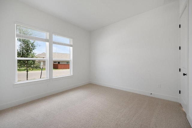 1601 Cardinal Ln, Round Rock, TX 78681 - spare room with light colored carpet