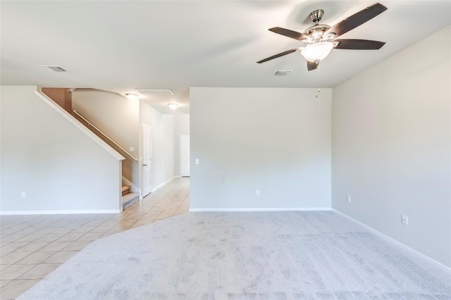 1710 Atlantica St, Cedar Park, TX 78613 - spare room with a ceiling fan, stairs, and tile patterned floors