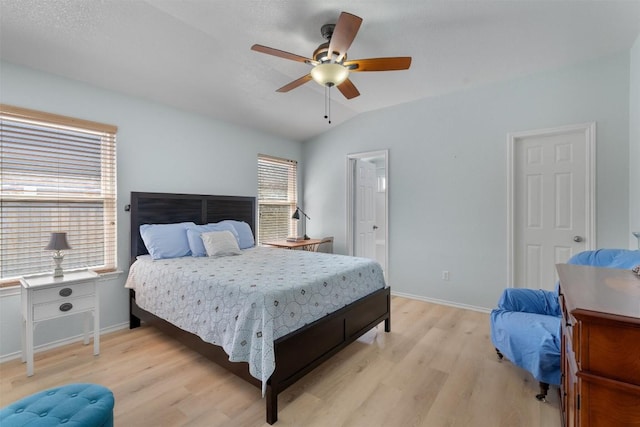 914 Flanagan Dr, Leander, TX 78641 - bedroom with light wood finished floors, lofted ceiling, and ceiling fan