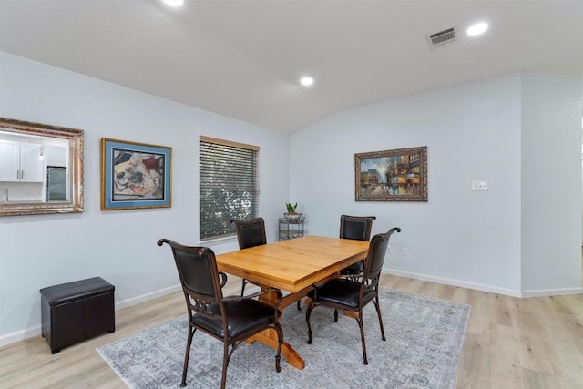 914 Flanagan Dr, Leander, TX 78641 - dining space featuring lofted ceiling, light wood-style floors, and recessed lighting