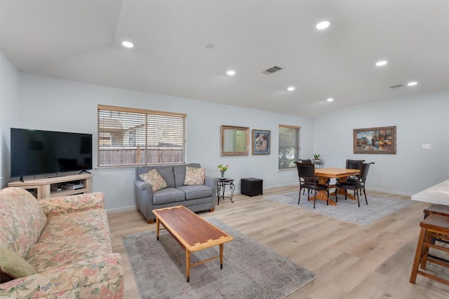 914 Flanagan Dr, Leander, TX 78641 - living area with lofted ceiling, light wood-type flooring, and recessed lighting