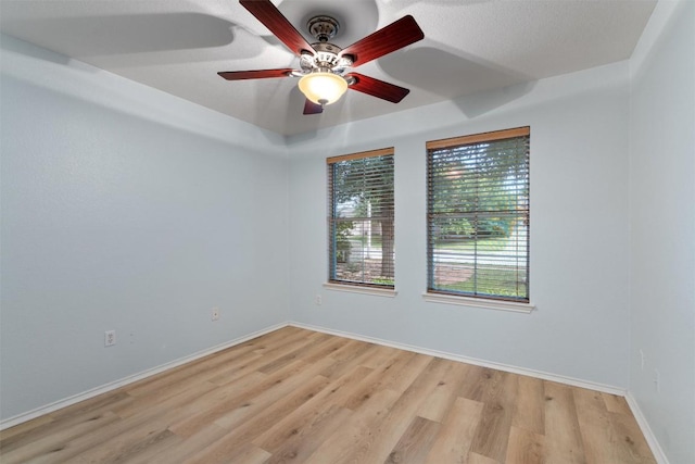 914 Flanagan Dr, Leander, TX 78641 - unfurnished room with a ceiling fan and light wood-style flooring