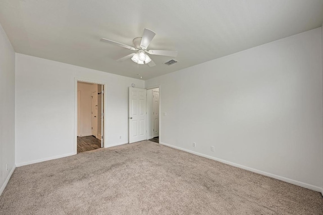 216 Cassandra Dr, Hutto, TX 78634 - unfurnished bedroom featuring carpet flooring and a ceiling fan