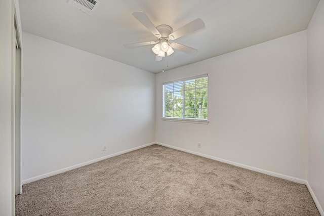 216 Cassandra Dr, Hutto, TX 78634 - empty room featuring light colored carpet and ceiling fan