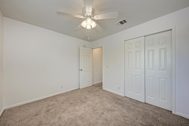 216 Cassandra Dr, Hutto, TX 78634 - unfurnished bedroom with carpet, a closet, and a ceiling fan