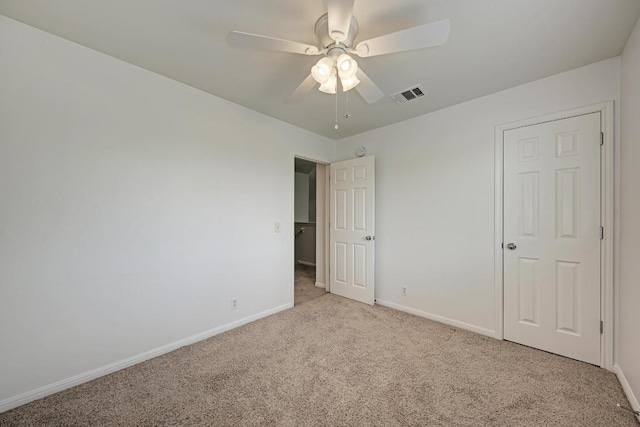 216 Cassandra Dr, Hutto, TX 78634 - unfurnished bedroom with carpet floors and ceiling fan