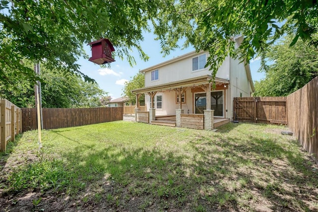 216 Cassandra Dr, Hutto, TX 78634 - back of property featuring a fenced backyard