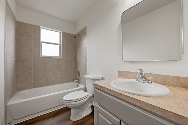 104 Live Oak Cir, Bertram, TX 78605 - full bathroom featuring vanity, shower / washtub combination, and wood finished floors