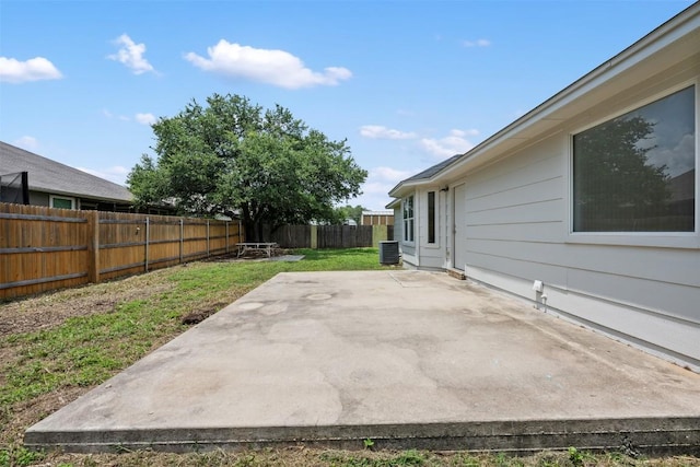 104 Live Oak Cir, Bertram, TX 78605 - fenced backyard featuring a patio