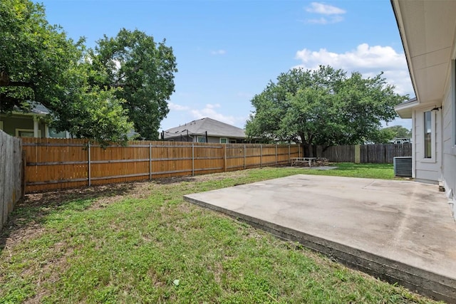 104 Live Oak Cir, Bertram, TX 78605 - fenced backyard with a patio