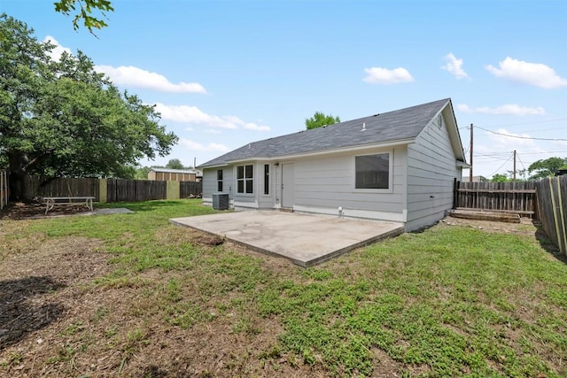104 Live Oak Cir, Bertram, TX 78605 - rear view of property featuring a patio and a fenced backyard