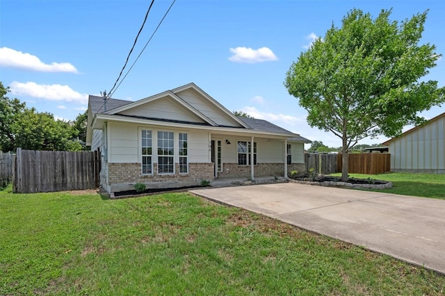 104 Live Oak Cir, Bertram, TX 78605 - view of front facade featuring brick siding
