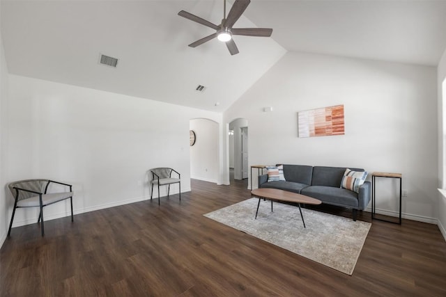 104 Live Oak Cir, Bertram, TX 78605 - living area with arched walkways, ceiling fan, wood finished floors, and high vaulted ceiling