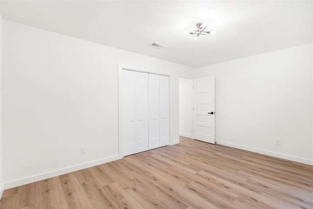 12416 Cassady Dr, Austin, TX 78727 - unfurnished bedroom with wood finished floors and a closet