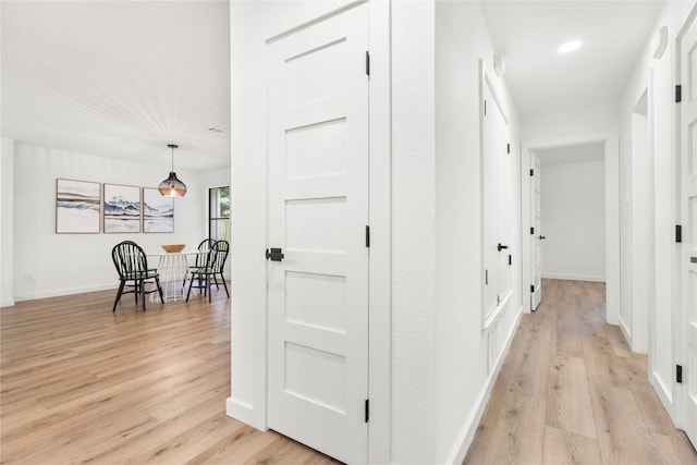 12416 Cassady Dr, Austin, TX 78727 - hallway featuring light wood-type flooring and recessed lighting