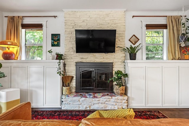 5201 Harvest Cir, Austin, TX 78745 - living area with a large fireplace, plenty of natural light, and ornamental molding