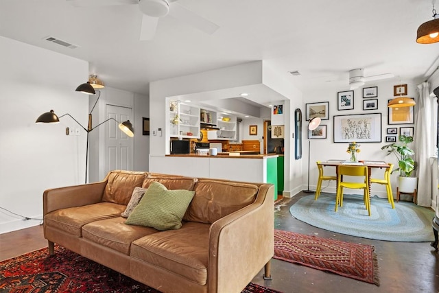 5201 Harvest Cir, Austin, TX 78745 - living room with ceiling fan and concrete flooring