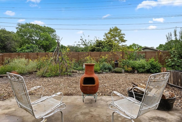 5201 Harvest Cir, Austin, TX 78745 - fenced backyard with a patio area