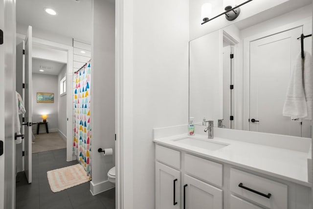611 Gaylor St Unit 2, Austin, TX 78752 - full bath featuring vanity, tile patterned floors, recessed lighting, and a shower with shower curtain