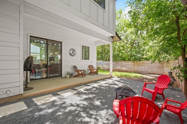 611 Gaylor St Unit 2, Austin, TX 78752 - fenced backyard with a fire pit and a patio