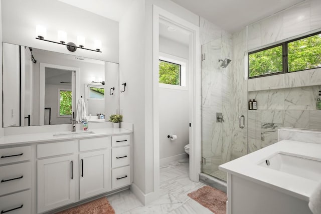 611 Gaylor St Unit 2, Austin, TX 78752 - full bathroom featuring marble finish flooring, vanity, and plenty of natural light