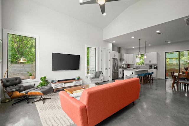 611 Gaylor St Unit 2, Austin, TX 78752 - living area featuring high vaulted ceiling, concrete flooring, a ceiling fan, and recessed lighting