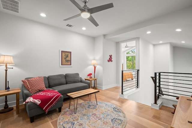 611 Gaylor St Unit 2, Austin, TX 78752 - living room with a ceiling fan, wood finished floors, and recessed lighting