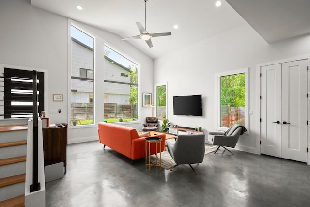 611 Gaylor St Unit 2, Austin, TX 78752 - living area featuring healthy amount of natural light, high vaulted ceiling, concrete flooring, and recessed lighting