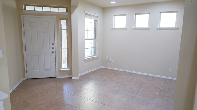 1024 Chad Loop, Round Rock, TX 78665 - entrance foyer with plenty of natural light, light tile patterned floors, and recessed lighting