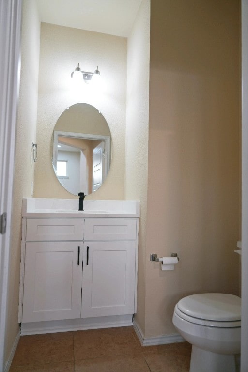 1024 Chad Loop, Round Rock, TX 78665 - half bath featuring vanity and tile patterned flooring
