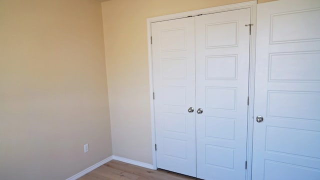 1024 Chad Loop, Round Rock, TX 78665 - unfurnished bedroom featuring a closet and light wood-type flooring