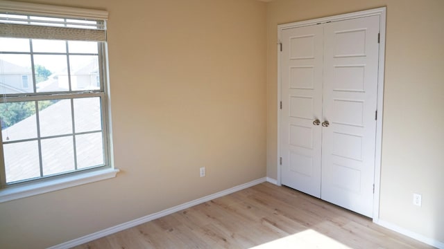 1024 Chad Loop, Round Rock, TX 78665 - unfurnished bedroom featuring light wood finished floors and a closet