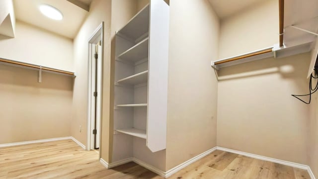 1024 Chad Loop, Round Rock, TX 78665 - walk in closet featuring wood finished floors