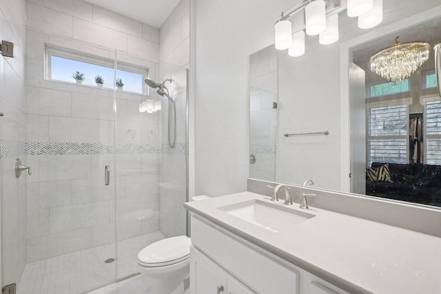 101 Cascading Water Pl, Austin, TX 78734 - full bath featuring a stall shower, vanity, and a chandelier