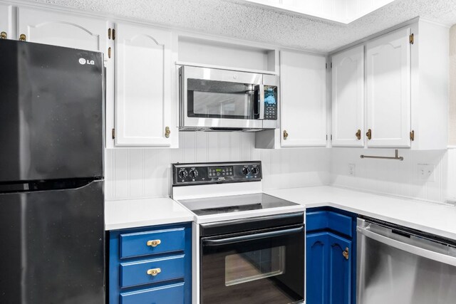 803 Lone Star Dr, Cedar Park, TX 78613 - kitchen featuring appliances with stainless steel finishes, blue cabinets, a textured ceiling, white cabinetry, and light countertops