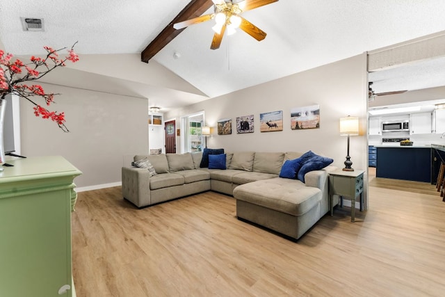 803 Lone Star Dr, Cedar Park, TX 78613 - living room featuring a ceiling fan, light wood-style floors, and a textured ceiling