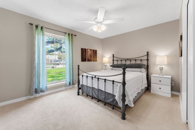 803 Lone Star Dr, Cedar Park, TX 78613 - bedroom with light colored carpet and a ceiling fan