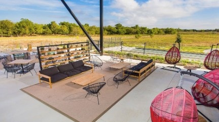 9501 Wiggy Way, Austin, TX 78744 - view of patio featuring an outdoor hangout area