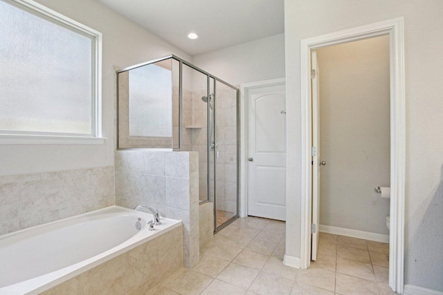 3200 Bravo Dr, Leander, TX 78641 - bathroom with a garden tub, a shower stall, tile patterned floors, and recessed lighting