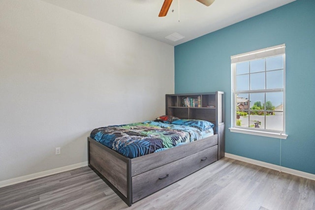 3200 Bravo Dr, Leander, TX 78641 - bedroom featuring wood finished floors and a ceiling fan