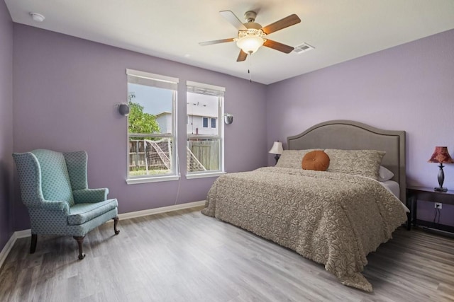 3200 Bravo Dr, Leander, TX 78641 - bedroom featuring wood finished floors and ceiling fan