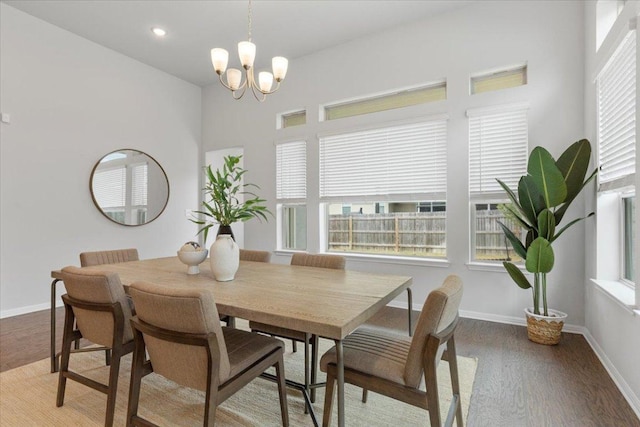 271 Eclipse Dr, Austin, TX 78737 - dining space with wood finished floors, a chandelier, and recessed lighting