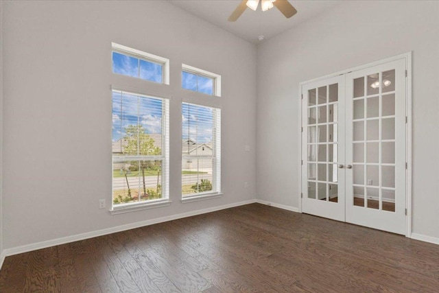 271 Eclipse Dr, Austin, TX 78737 - spare room featuring french doors, wood finished floors, and a ceiling fan