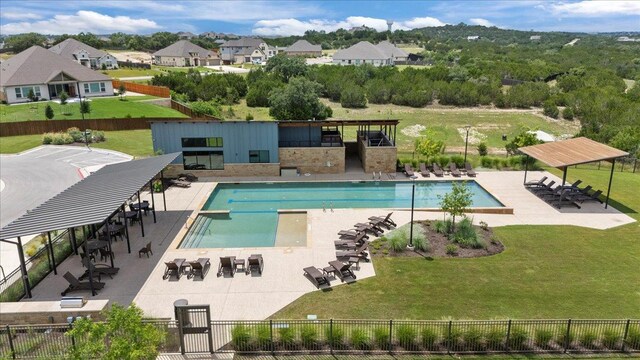 271 Eclipse Dr, Austin, TX 78737 - community pool with a patio area and a residential view