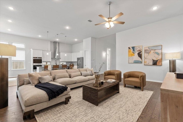 271 Eclipse Dr, Austin, TX 78737 - living room with wood finished floors, ceiling fan, and recessed lighting