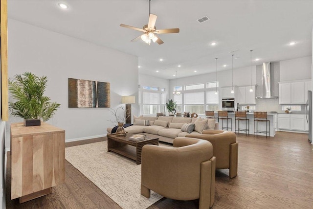 271 Eclipse Dr, Austin, TX 78737 - living room with wood finished floors, ceiling fan, and recessed lighting