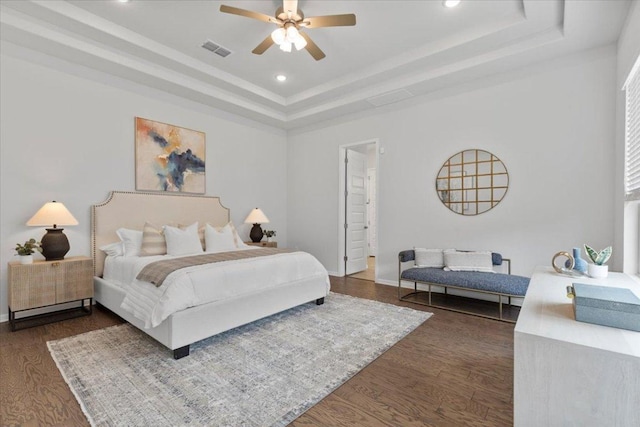 271 Eclipse Dr, Austin, TX 78737 - bedroom with a raised ceiling, dark wood-type flooring, recessed lighting, and a ceiling fan
