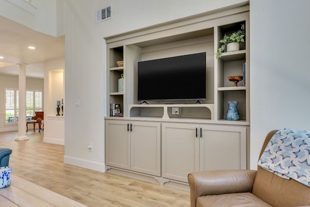 38 Cottondale Rd, The Hills, TX 78738 - living area featuring decorative columns, light wood-type flooring, and recessed lighting