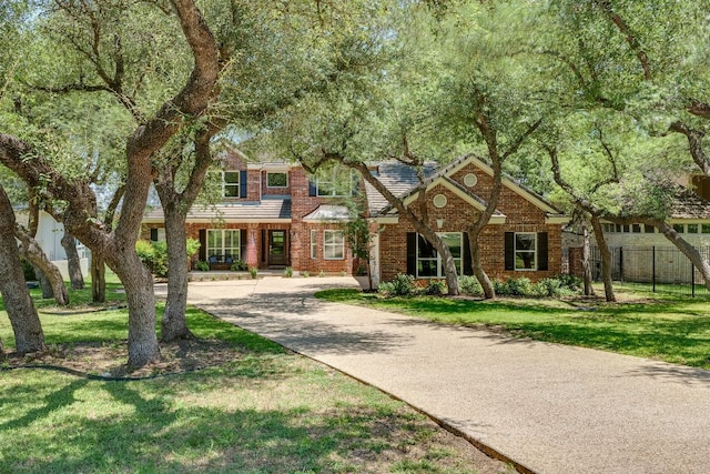 38 Cottondale Rd, The Hills, TX 78738 - view of front of house with brick siding