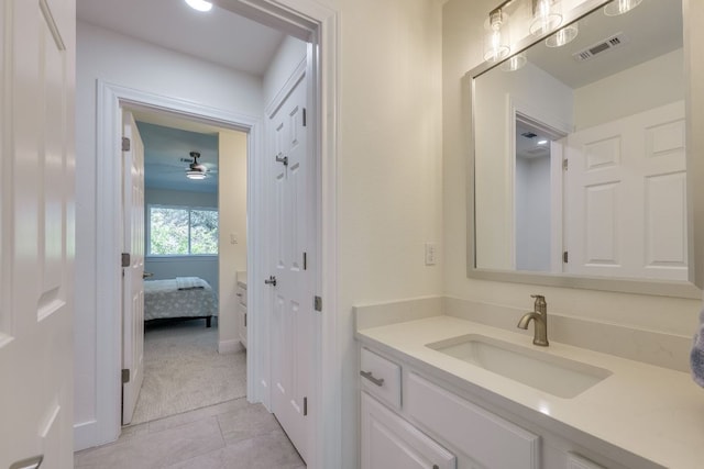 38 Cottondale Rd, The Hills, TX 78738 - bathroom featuring vanity, tile patterned flooring, ensuite bath, and ceiling fan